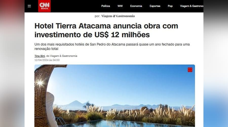 Imagem de uma notícia do CNN Brasil destacando o anúncio do Hotel Tierra Atacama, no Sudoeste do Deserto do Atacama, com investimento de US$ 12 milhões, mostrando uma vista panorâmica do deserto e do hotel.